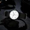 Черен часовник с кожена каишка и бял циферблат